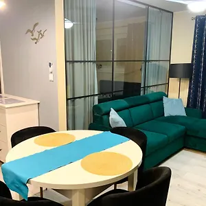 https://caoroczny-apartament-perowa-przysta.kolobrzeghotels.com